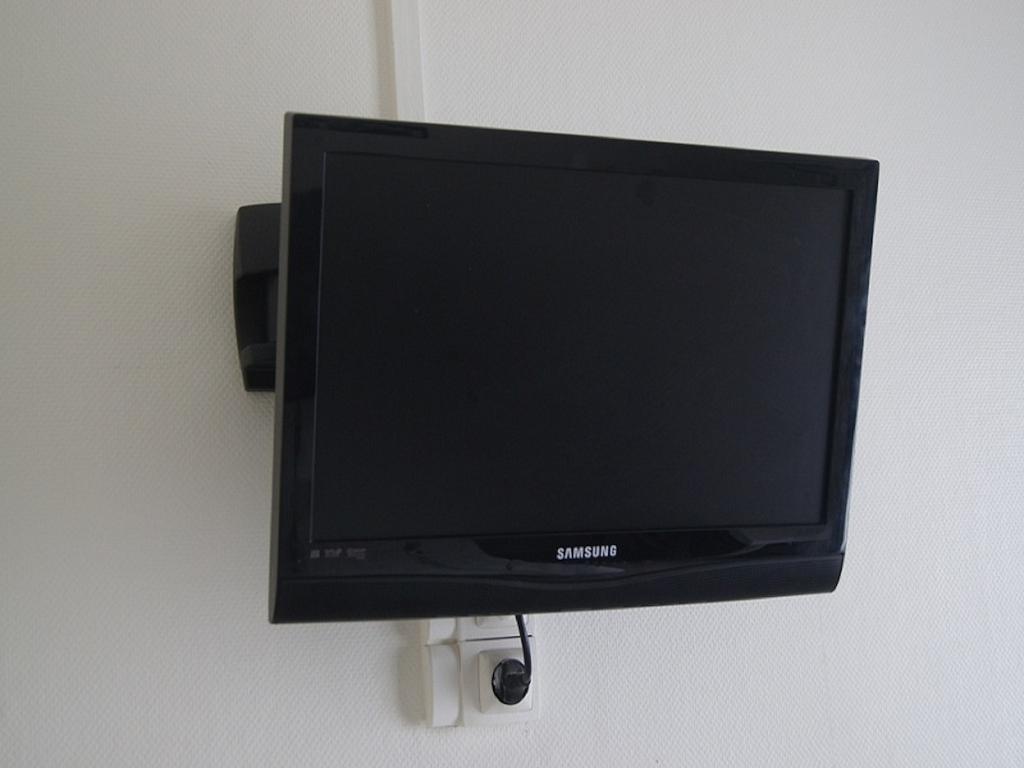 Hotel Moderne Maisons-Alfort Camera foto A Samsung TV